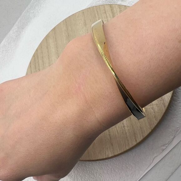 Kate Spade New York Black Enamel and Gold Tone Wave Twist Bangle Bracelet - Picture 8 of 11